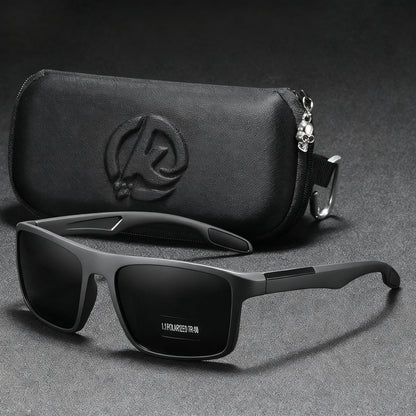Black sunglasses with a matching case on a gray background