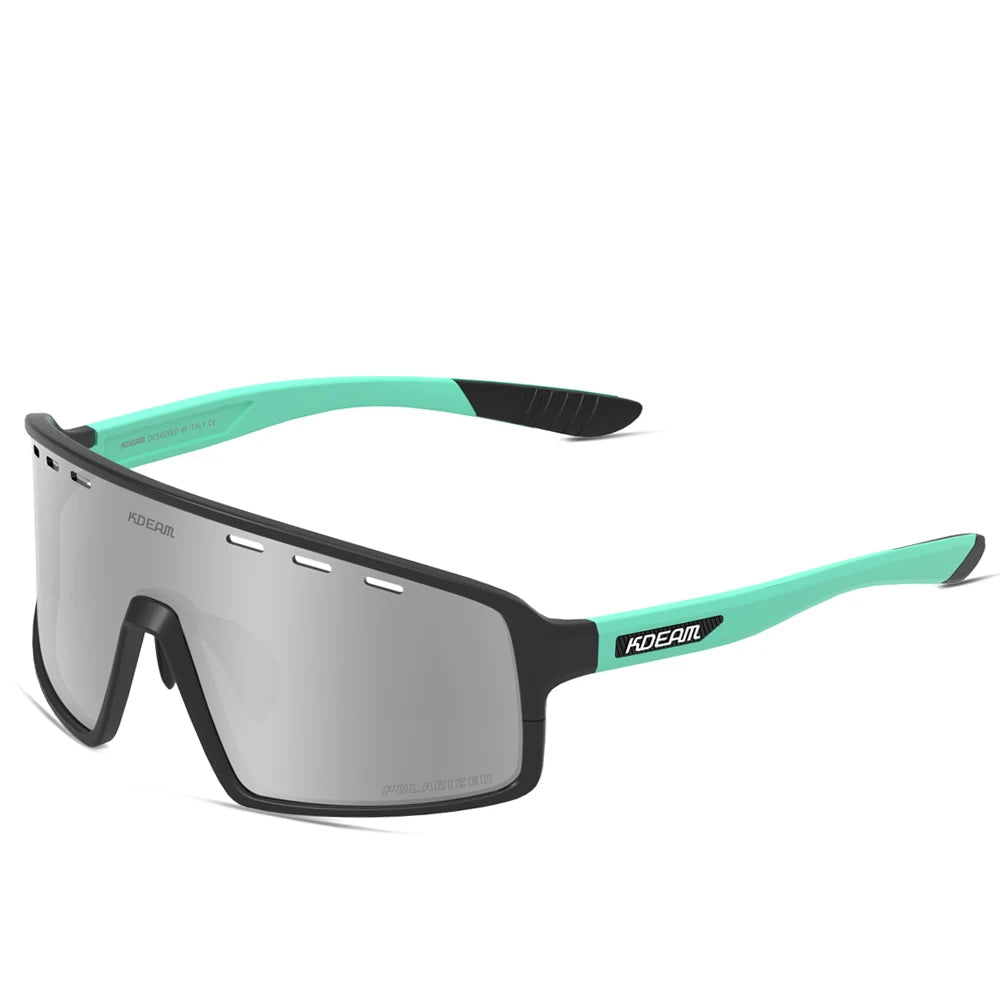 Sunglasses with black and green frame on a white background