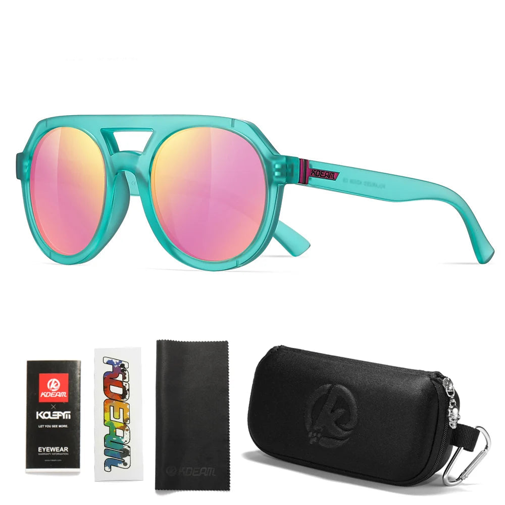 Teal sunglasses with pink mirrored lenses, case, and packaging on a white background
