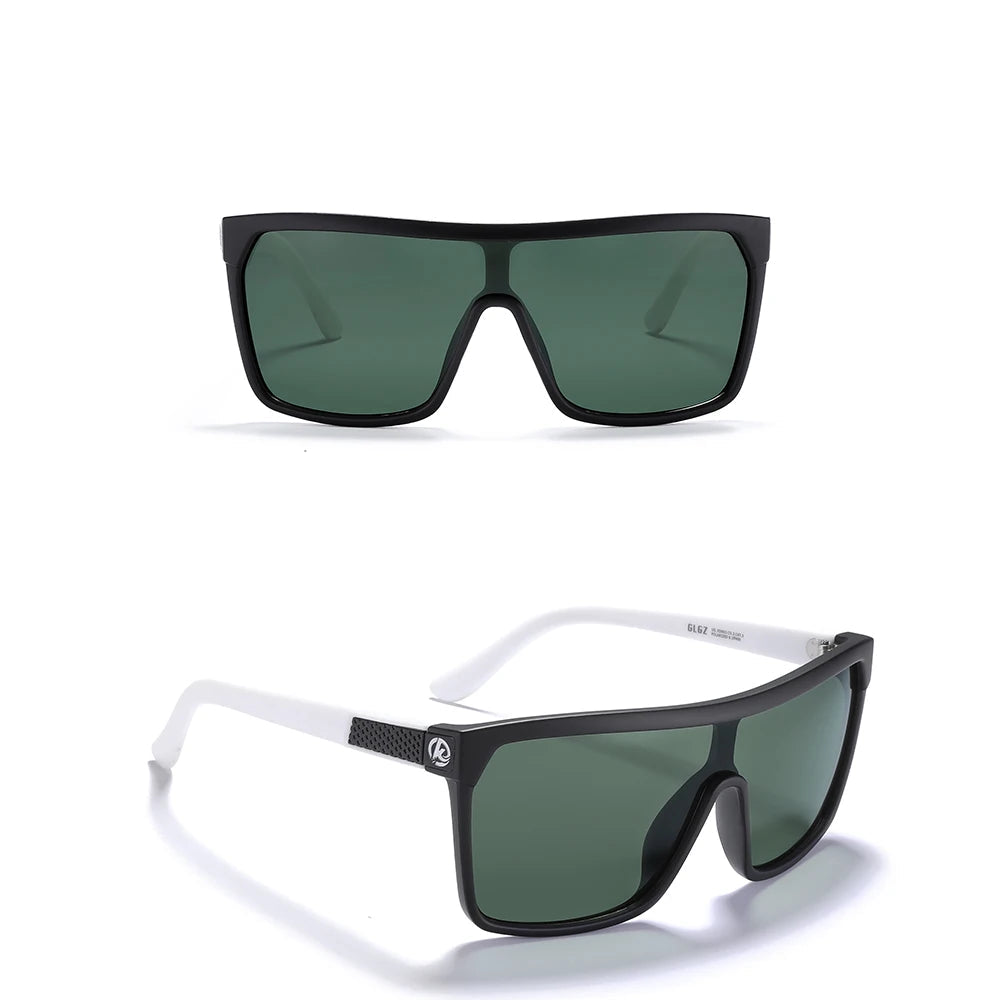Sunglasses with matte black and white frame and green lenses on a white background